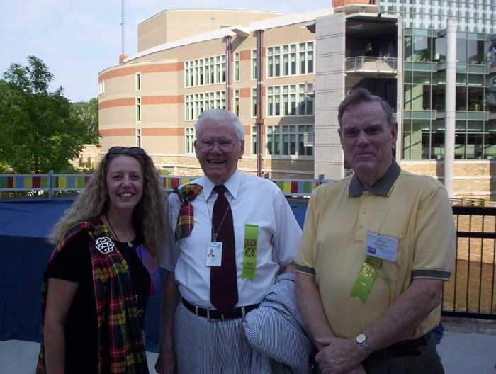 Stacy Harper, Watsonian President, Bill Watson, and Billy Griggs, another smallpox pioneer, chat before the Memorial Dedication