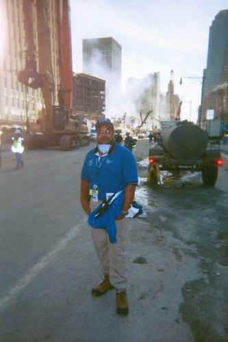 PHA in front of rubble from the World Trade Center