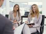 Women conducting interview