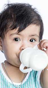 	Boy drinking milk