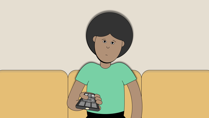 A person shrugs their shoulders while holding a television remote.